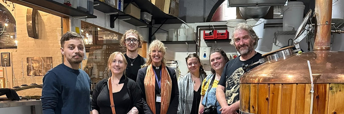 Jon Mills, Reverend Dr Emma Pennington and the Canterbury Christ Church University team at The Foundry brewery in Canterbury
